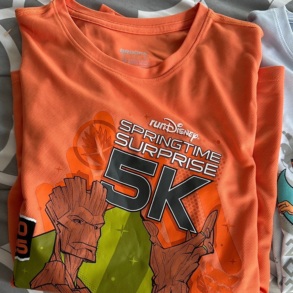 Brooks Orange Graphic Tee 5k and blue 10K race shirt